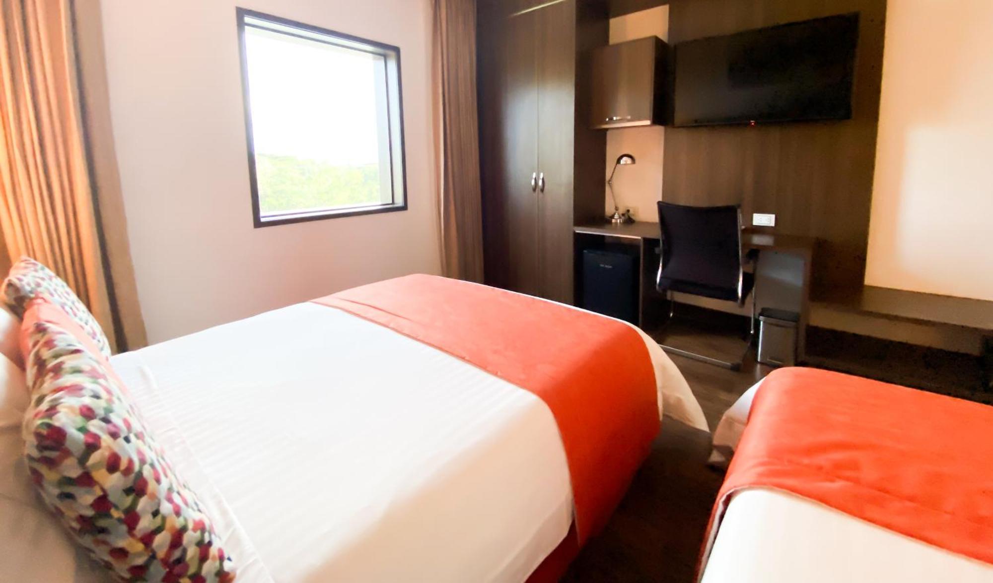Hotel Royal Elim International Cali Kültér fotó A room at the hotel