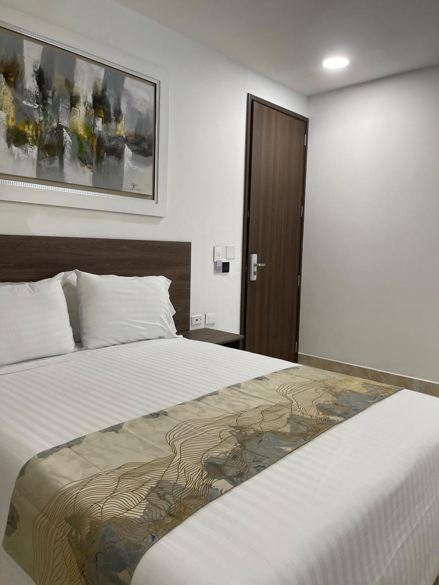 Hotel Royal Elim International Cali Kültér fotó A room at the hotel